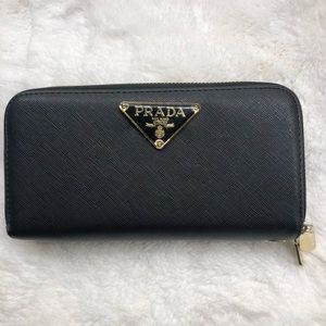 This classic, zippered, black wallet is EVERYTHING